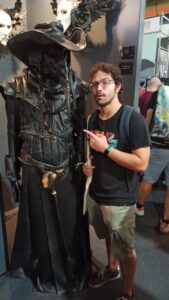 Ambrosio with a statue.