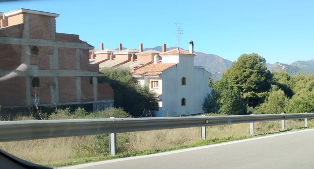 Mid-Costa del Sol residential golf resort empty properties invite squatting.