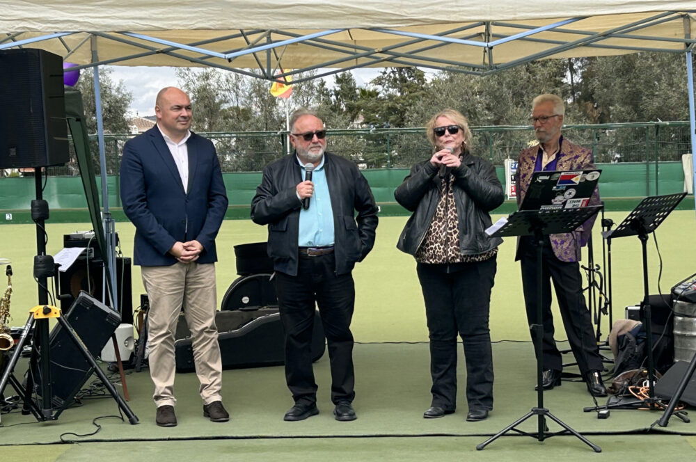 Mayors Beltrán and Villanueva with Helen on translation.