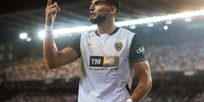 Spanish footballer is arrested over alleged sexual assault of a 25-year-old woman at a private house party in Valencia