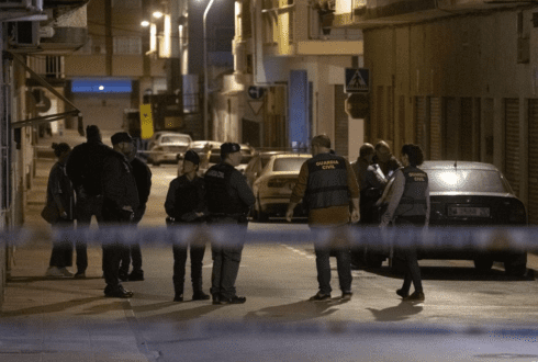 British victim of doorway shooting by hooded man may never walk again according to medics in Spain