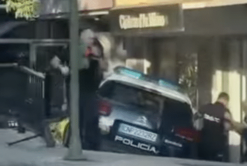 Shocking moment police car smashes into motorcyclist during high speed chase in Marbella