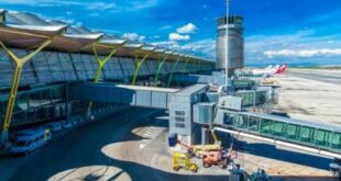 Police arrest woman on Madrid airport plane for stealing coat at security control
