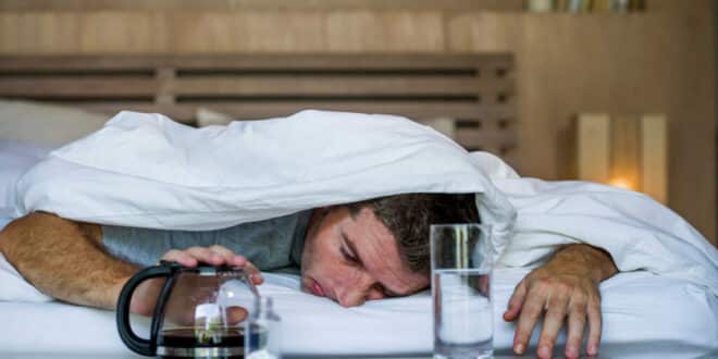 The hangover enigma: Why some escape the morning-after misery and how to avoid it this New Year’s Eve