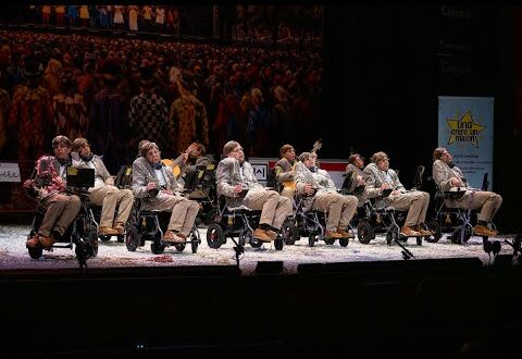 WATCH: Bizarre moment carnival group in wheelchairs parades as Stephen Hawking in southern Spain – before belting out songs dedicated to late physicist