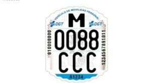 Official DGT identification sticker for electric scooters showing unique registration code