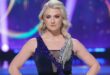 British-born ice skater and TV’s ‘Dancing on Ice’ winner will carry Spain’s flag at Winter Olympics opening ceremony