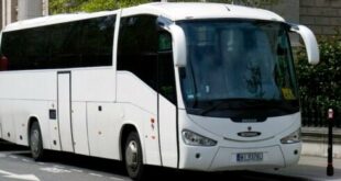 A white coach