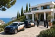 Mossos d'Esquadra officers outside a villa in Catalonia