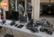 Seized electronics and tools outside an Almería shop