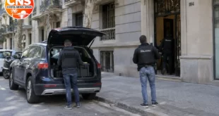 Police search scene in Barcelona's Eixample district