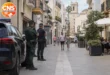 Police presence on a quiet street in Oliva, Valencia
