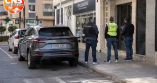 Police activity outside a building in Fuengirola