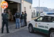 Guardia Civil officers outside a warehouse in Ceuta