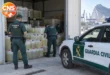 Guardia Civil officers inspect seized fuel containers in Algeciras