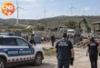 Wind turbines in rural Catalonia near a recycling yard